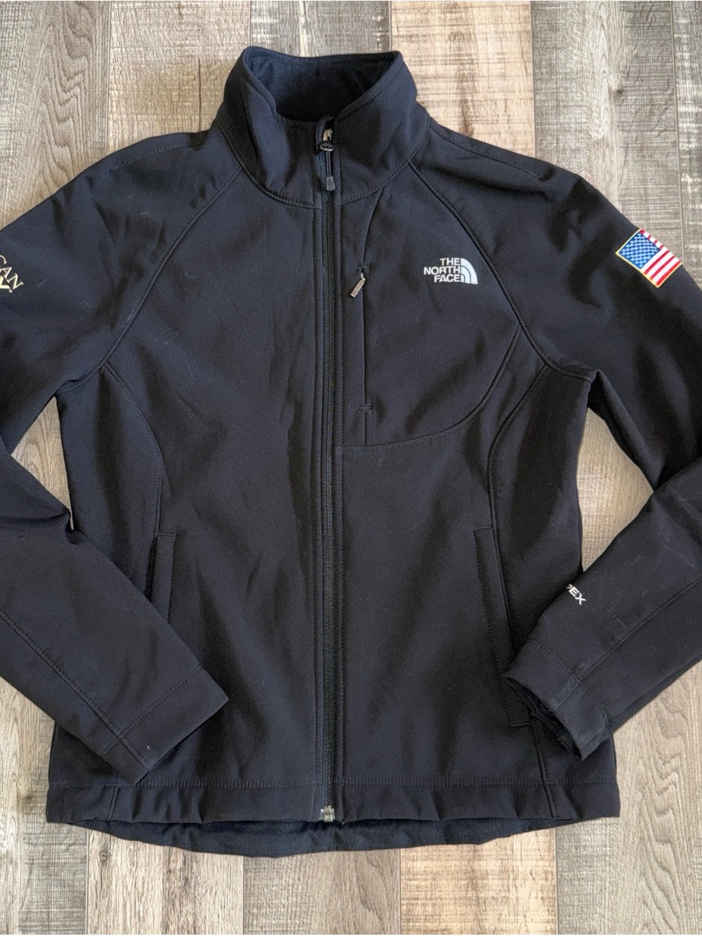 The North Face Black Softshell Jacket with USA Flag Patch size small